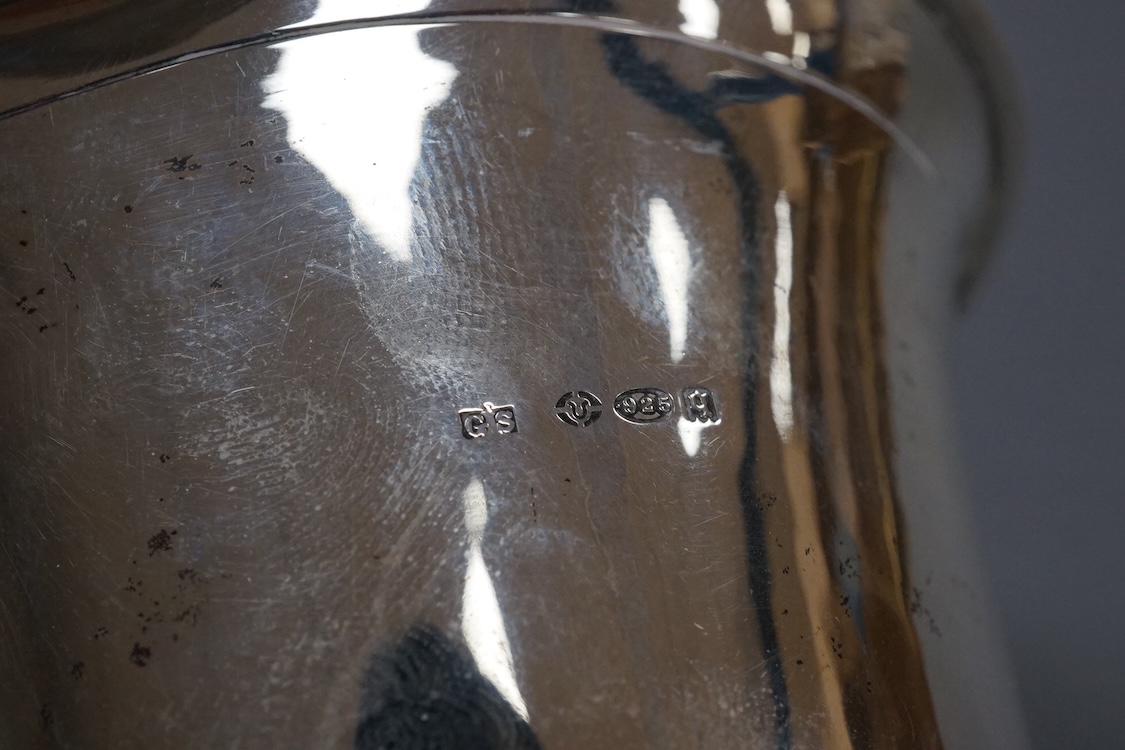 A Georg Jensen sterling 925 beaker, with flared rim and engraved inscription 'The Bookies Cup, 1933' design no.107A, 1925-1932 mark, import marks for George Stockwell, London, 1931, height 13.5cm, 174 grams (a,f,).